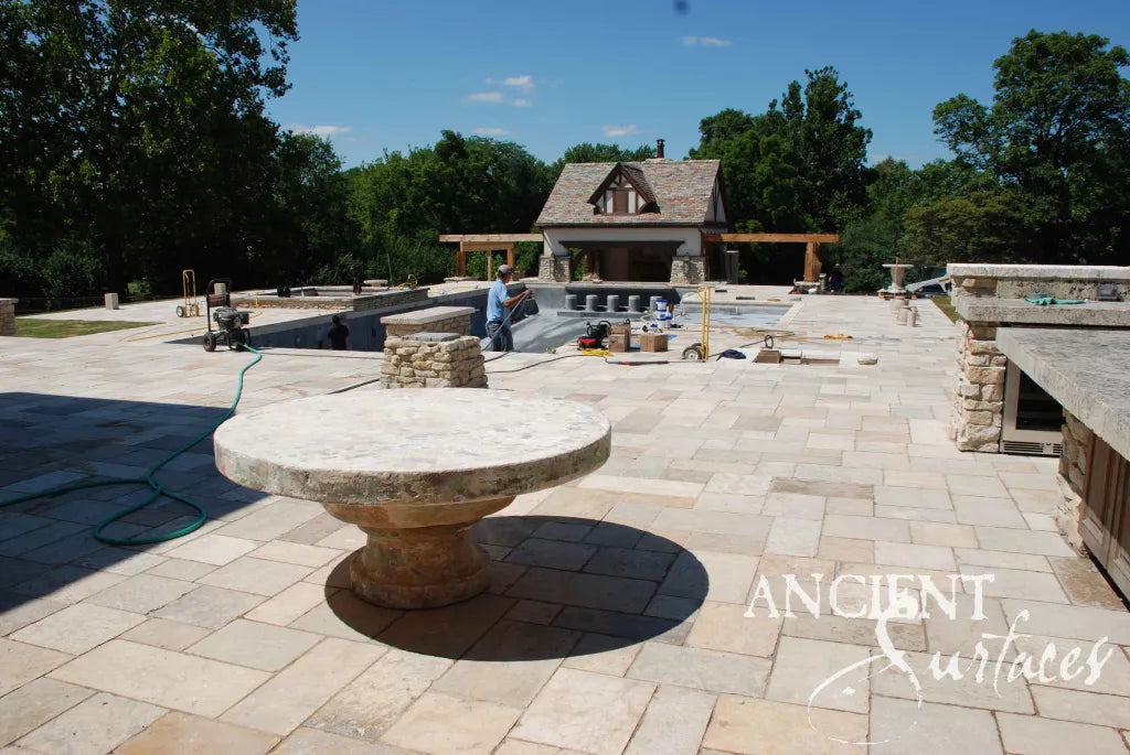 reclaimed_antique_limestone_tables_hand_carved_stone_dining_and_console_tables_ancient_surfaces_mediterranean_european_craftsmanship_old_world_design_antique_stone_furniture_reclaimed_limestone_artisan_tabletops_outdoor_and_indoor_stone_artworks