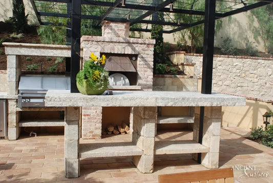 reclaimed_antique_limestone_tables_hand_carved_stone_dining_and_console_tables_ancient_surfaces_mediterranean_european_craftsmanship_old_world_design_antique_stone_furniture_reclaimed_limestone_artisan_tabletops_outdoor_and_indoor_stone_artworks
